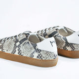 Back view of low top python skin sneaker. Full snake skin upper and honey coloured rubber sole.