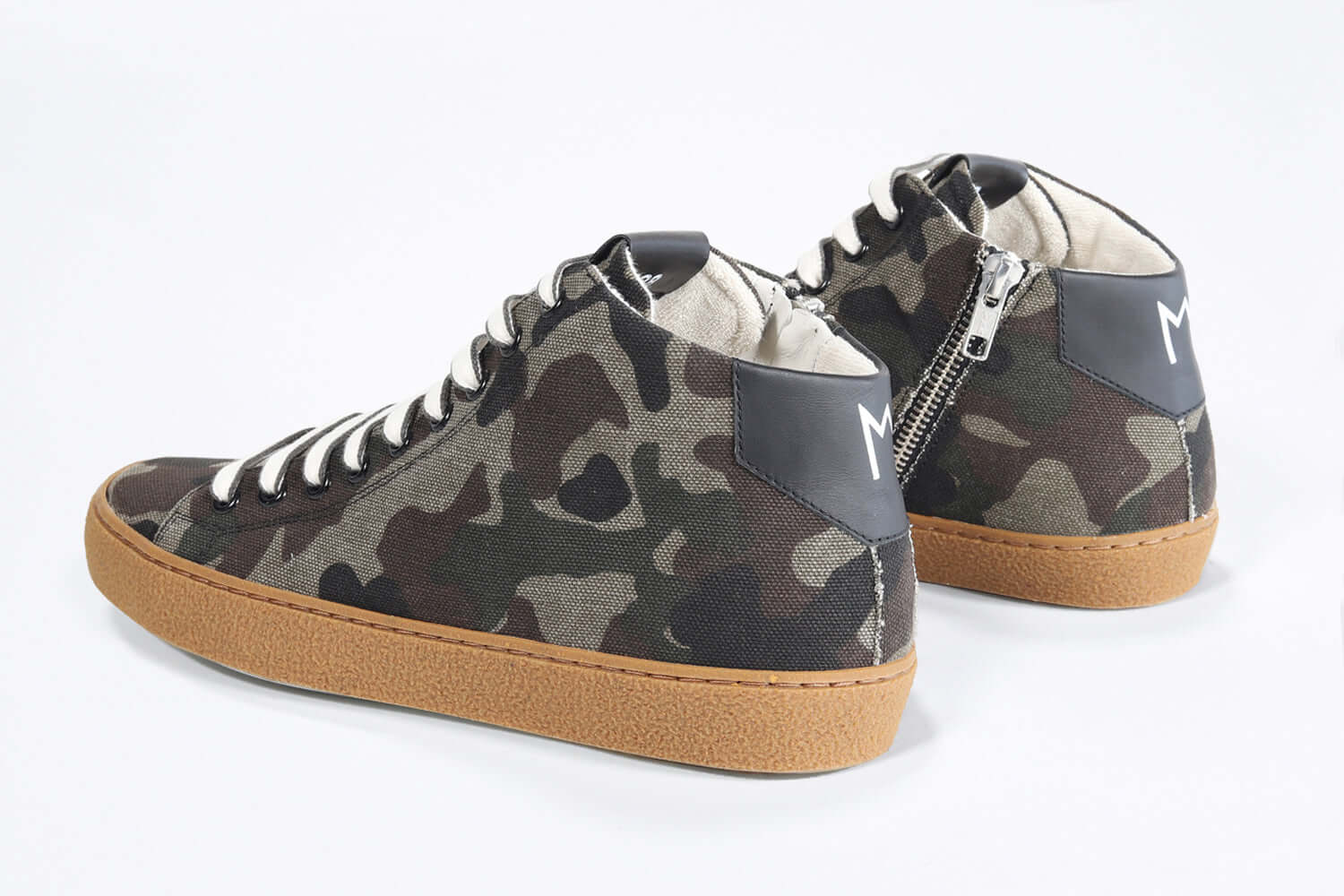 Back view of mid top camouflage print sneaker in canvas, internal zip and honey coloured sole.