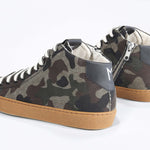 Back view of mid top camouflage print sneaker in canvas, internal zip and honey coloured sole.