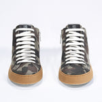 Front view of mid top camouflage print sneaker in canvas, internal zip and honey coloured sole.