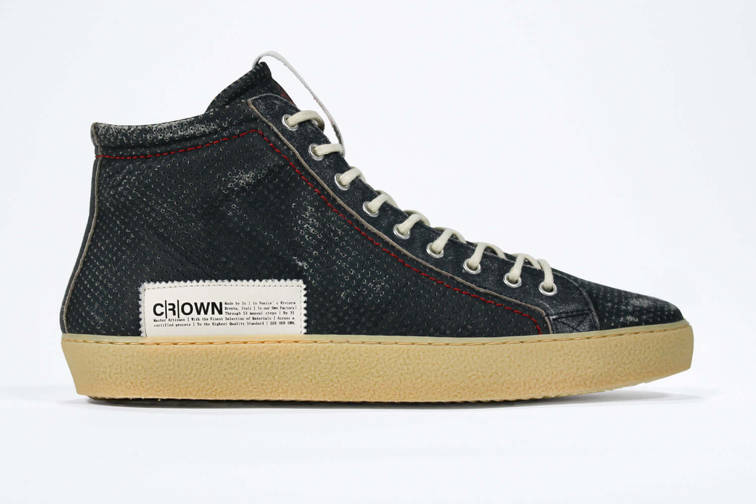 Side profile of high top perforated aged navy leather sneaker with signature red stitching and a pale natural rubber sole.
