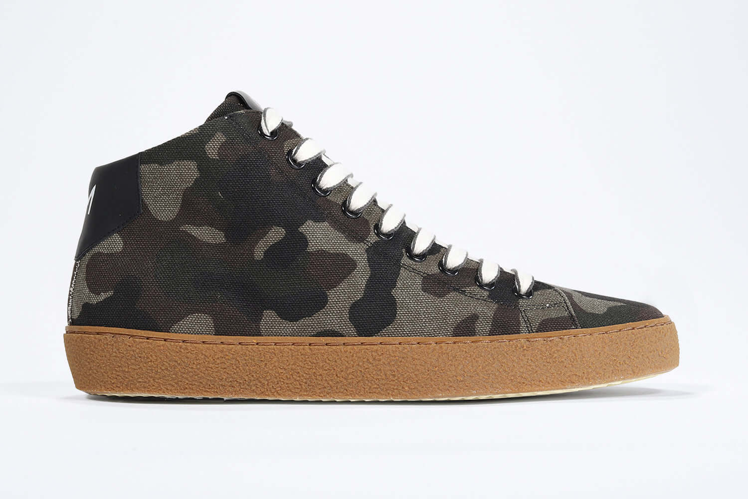 Side profile of mid top camouflage print sneaker in canvas, internal zip and honey coloured sole.