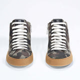Front view of mid top camouflage print sneaker in canvas, internal zip and honey coloured sole.
