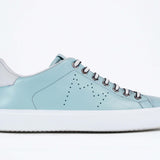 Side profile view of low top sky blue sneaker with white detailing and perforated crown logo on upper. Full leather upper and white rubber sole.