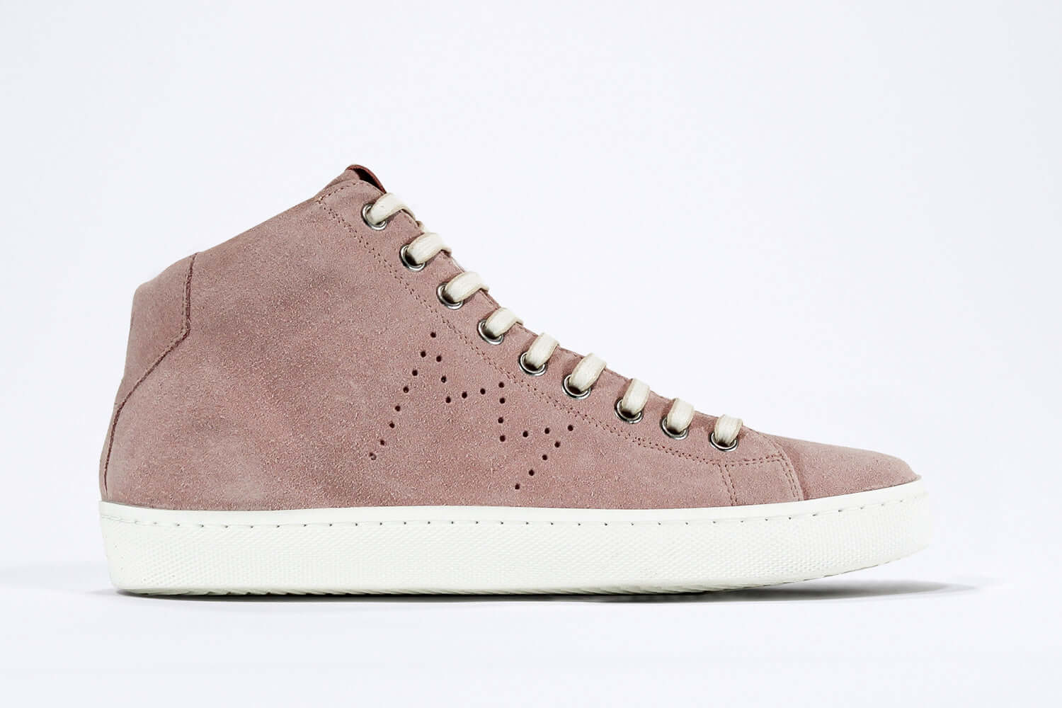  Side profile of mid top sneaker in pink suede and leather upper, internal zip and white sole.