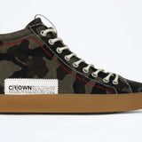 Side view of high top canvas sneaker. Camouflage canvas upper with signature red stitching and a dark natural rubber sole.