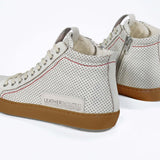 Back view of high top perforated aged white leather sneaker with signature red stitching and a dark natural rubber sole.