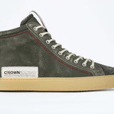Side profile of high top perforated aged khaki leather sneaker with signature red stitching and a pale natural rubber sole.