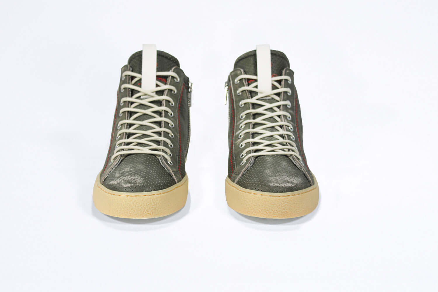 Front view of high top perforated aged khaki leather sneaker with signature red stitching and a pale natural rubber sole.