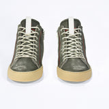 Men's ORIGINAL LC17 High-top Perforated Aged-Khaki Leather sneaker with signature red stitching and a dark natural rubber sole.