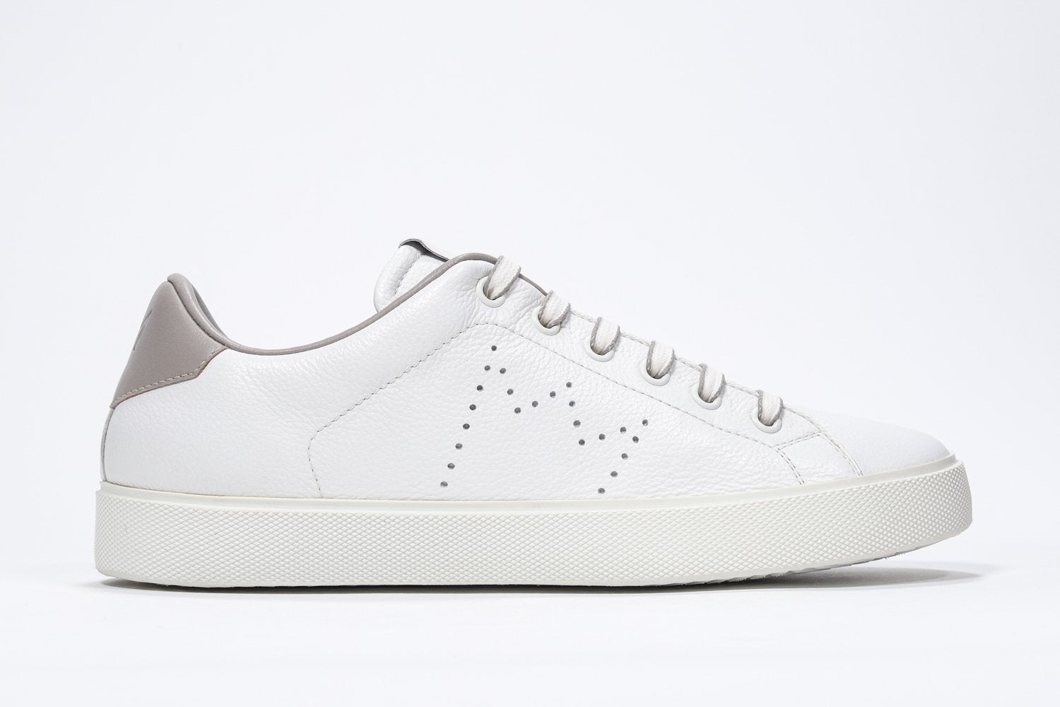 Side profile of low top white sneaker with beige detailing and perforated crown logo on upper. Full leather upper and white rubber sole.
