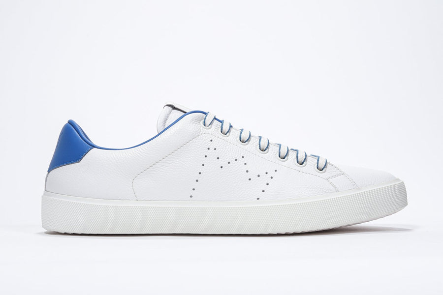 Side profile of low top white sneaker with blue detailing and perforated crown logo on upper. Full leather upper and white rubber sole.