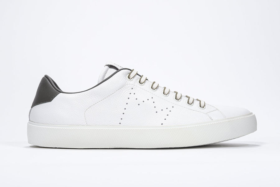 Side profile of low top white sneaker with military green detailing and perforated crown logo on upper. Full leather upper and white rubber sole.