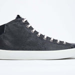 Side profile of mid top navy sneaker with full suede upper with perforated crown logo, internal zip and white sole.