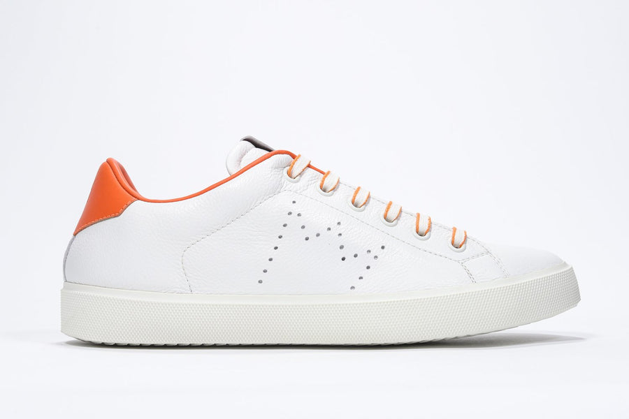 Side profile of low top white sneaker with orange detailing and perforated crown logo on upper. Full leather upper and white rubber sole.
