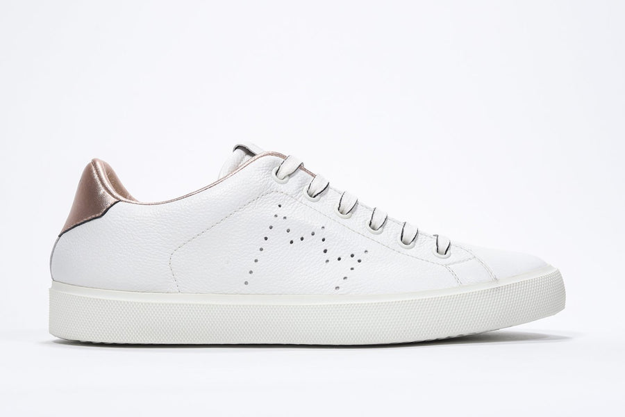 Side profile view of low top white sneaker with rose gold detailing and perforated crown logo on upper. Full leather upper and white rubber sole.